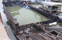 Cả trăm tấn axid clohydric chìm xuống sông Đồng Nai