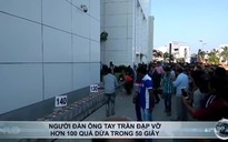 Người đàn ông tay trần đập vỡ hơn 100 quả dừa trong 50 giây